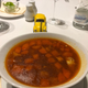 The bug enjoying some goulash and palinka